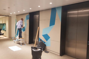 Vinyl Wrapping used to reclad Office Lifts